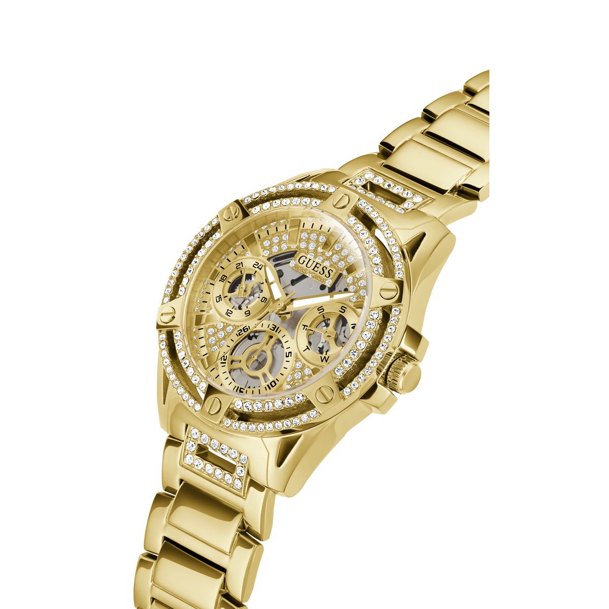 Gold-tone Guess wristwatch with a crystal-studded bezel, skeleton dial, and matching crystal-accented bracelet on a white background.