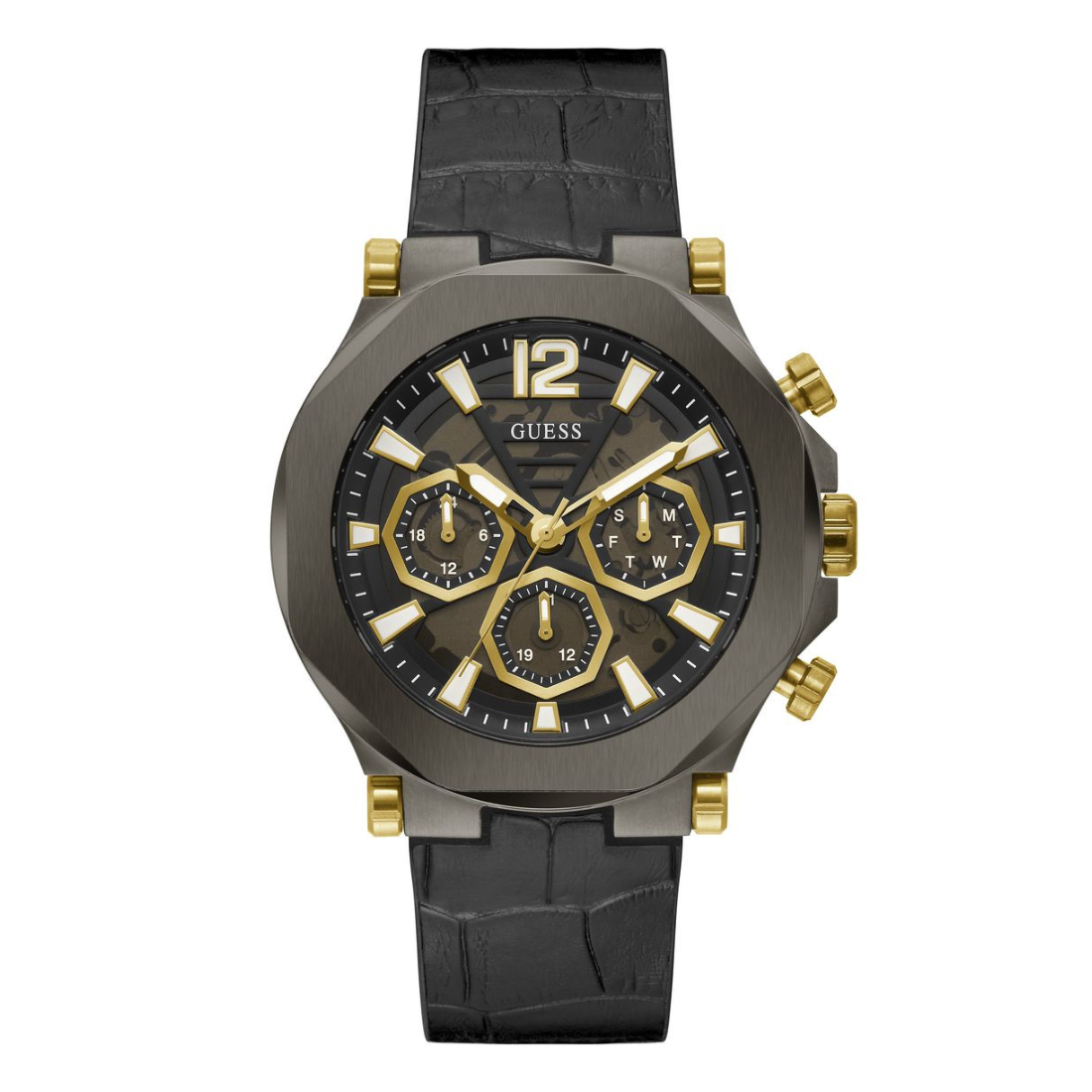 A GUESS men's chronograph watch featuring a dark gunmetal gray case, a black dial with gold-tone subdials and markers, and a black textured strap with gold-tone accents.