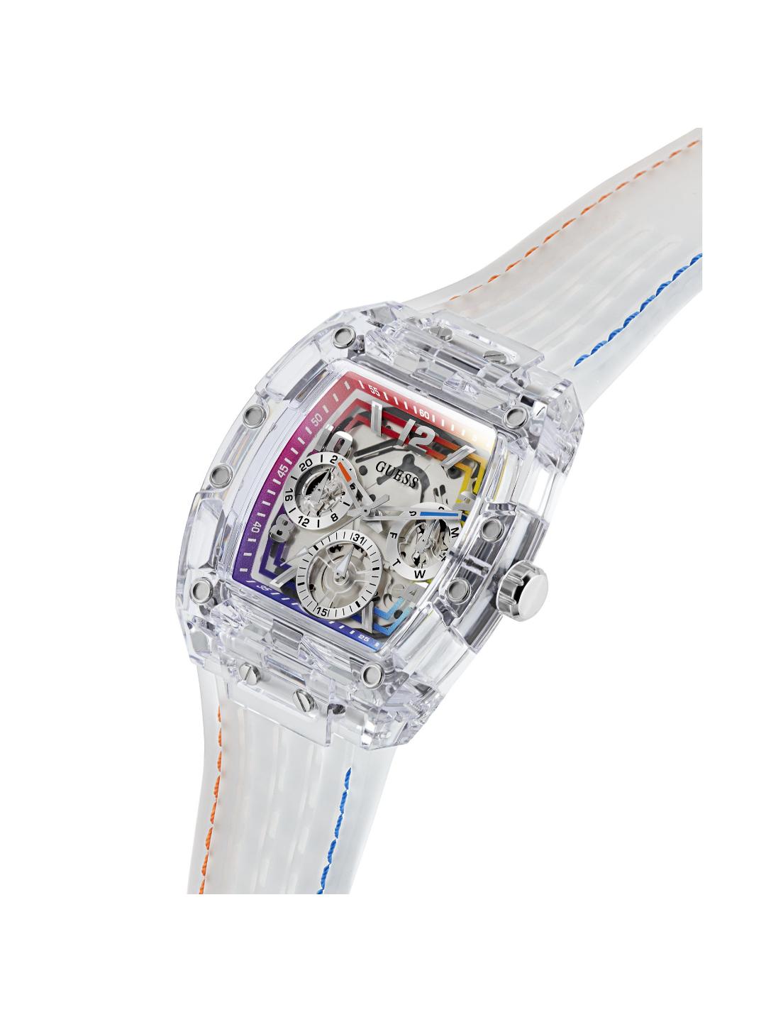 A clear transparent watch with a white strap featuring orange and blue stitching, showcasing a detailed mechanical movement inside.