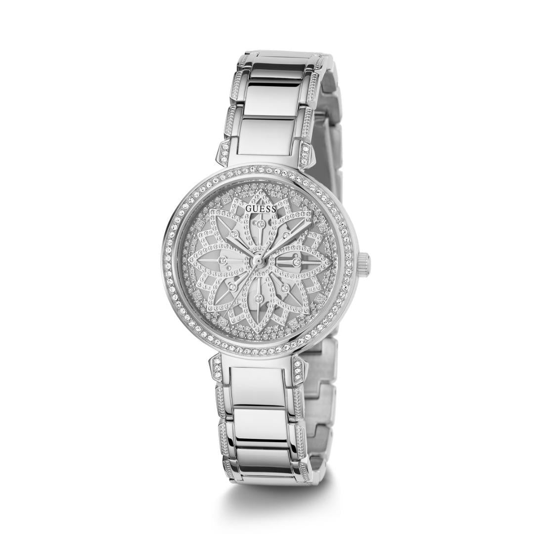 Silver watch with floral design on the dial against a white background