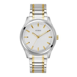 A two-tone stainless steel and gold wrist watch with a textured white dial, featuring the GUESS brand name on the dial, set against a plain white background.