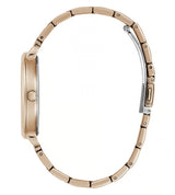 A side profile view of a women's watch featuring a rose gold-toned metal link bracelet and a matching round case, with a silver-toned clasp visible on the right side, set against a plain white background.