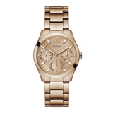 A GUESS women's analog watch with a rose gold-tone stainless steel case and link bracelet, featuring a textured dial with multiple sub-dials and a date window.