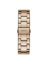 A rose gold stainless steel link watch band with a polished finish and the 'GUESS' logo engraved on the clasp, shown against a solid white background.