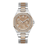 Guess watch with silver and rose gold band on a white background