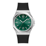 A Guess wristwatch with a silver-tone octagonal case, a green dial with Roman numeral hour markers, and a black strap, shown against a plain white background.