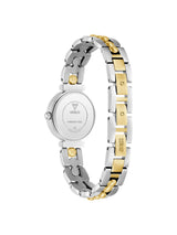 A two-tone stainless steel and gold Guess watch shown from the back, featuring a silver-toned round case and a link bracelet with alternating silver and gold segments.