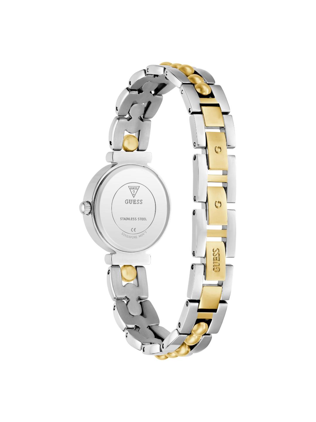 A two-tone stainless steel and gold Guess watch shown from the back, featuring a silver-toned round case and a link bracelet with alternating silver and gold segments.