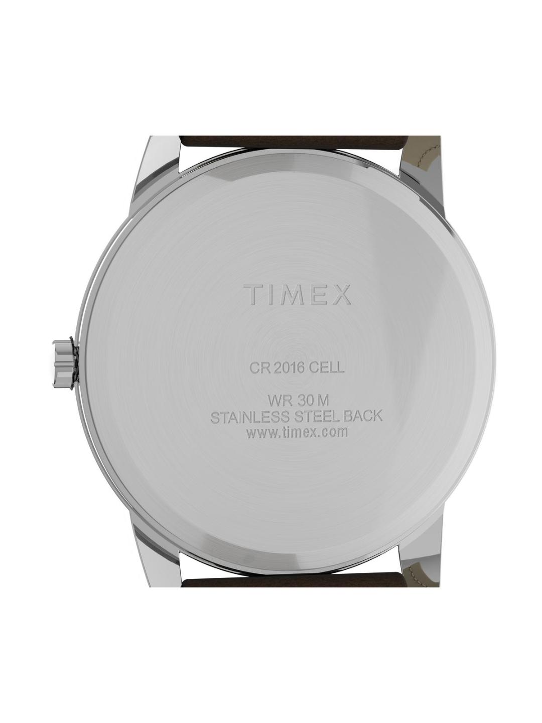 The back of a Timex watch with a stainless steel case and a dark brown leather strap, featuring engraved text on a white background.