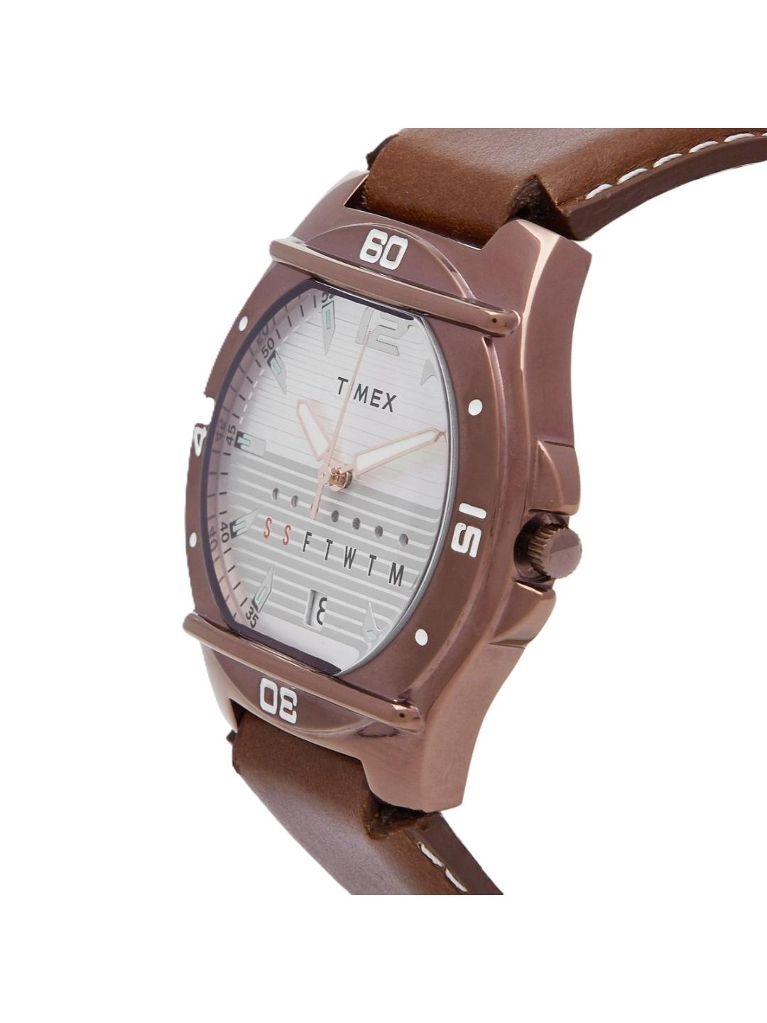 Timex watch with brown leather strap on a white background