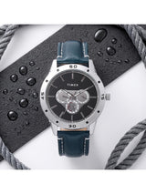 Timex watch with blue leather strap on a white background