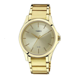 Gold Timex watch on a white background