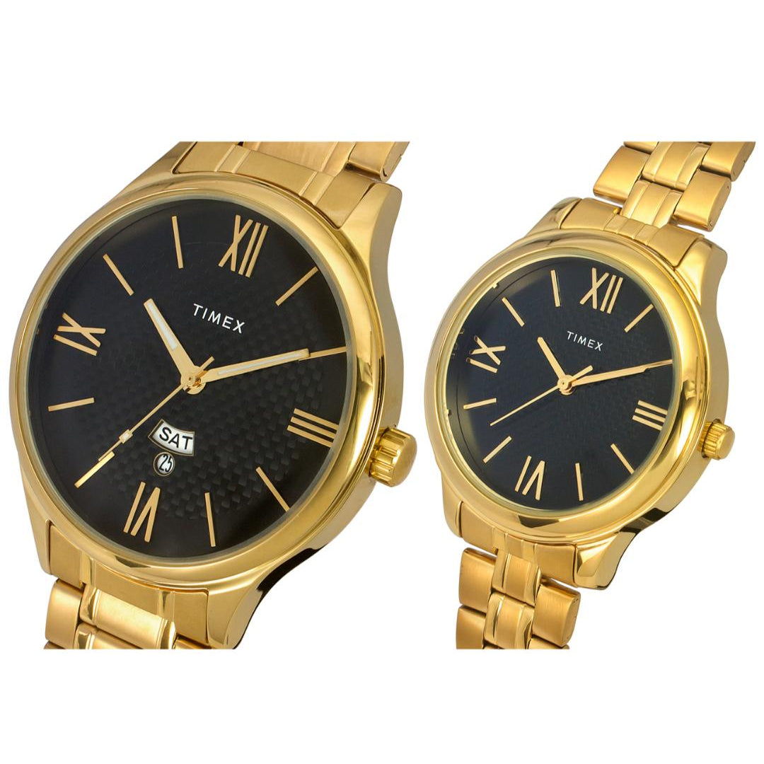 Two gold Timex watches with black faces on a white background