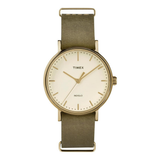 A Timex Indiglo watch with a round gold-tone case, cream-colored dial, and an olive green leather strap, shown against a plain white background.