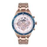 Rose gold watch with a blue bezel on a white background