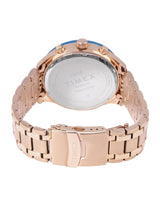 Rose gold Timex watch with a white background