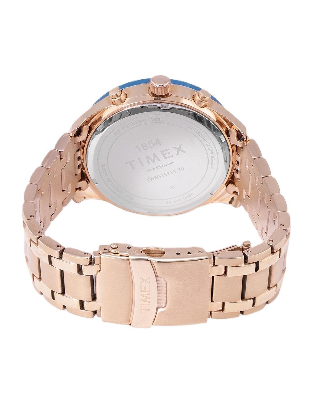 Rose gold Timex watch with a white background
