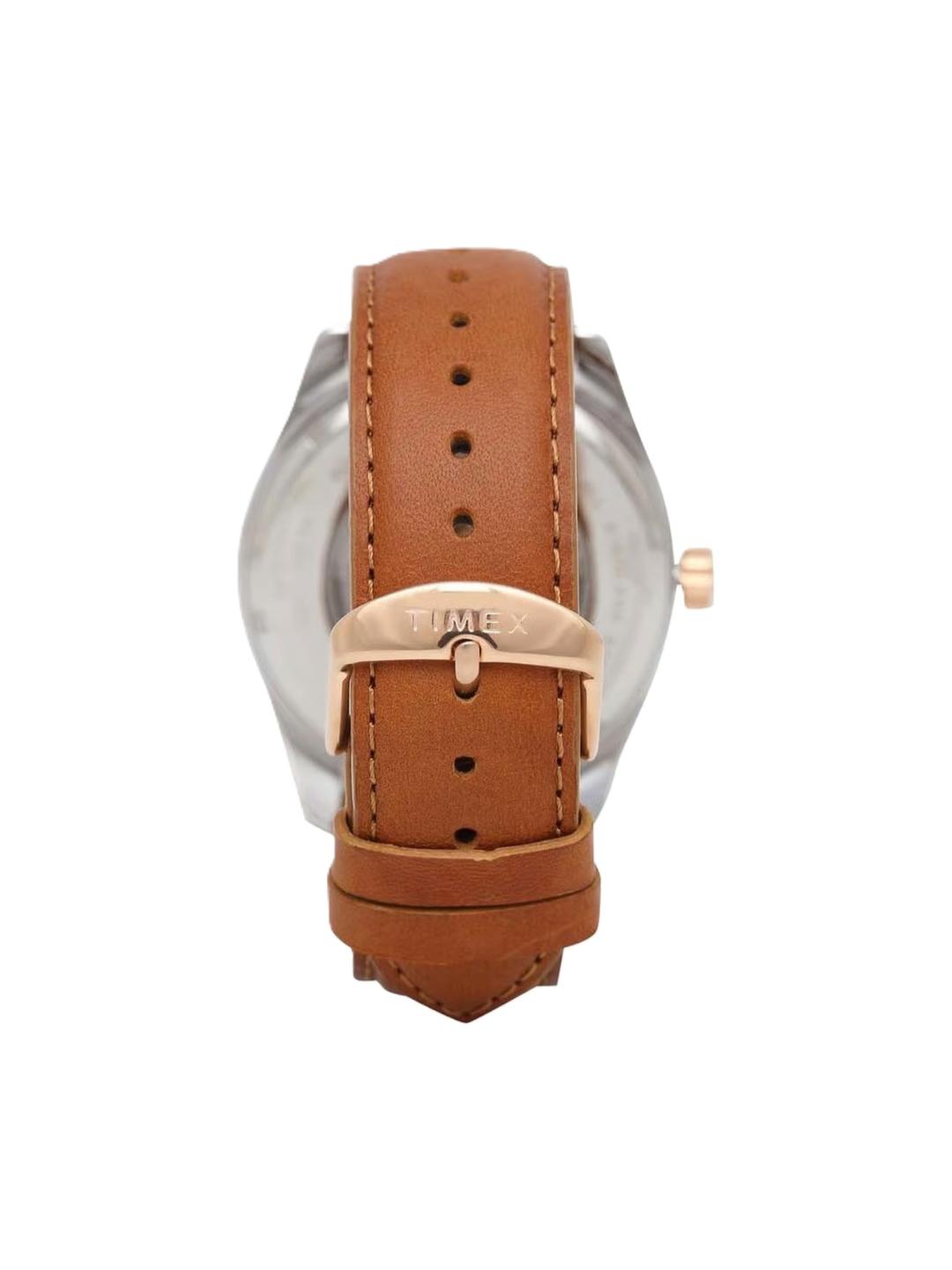 Watch with brown leather strap and rose gold accents on a white background