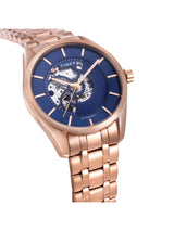 Rose gold watch with blue face on a white background