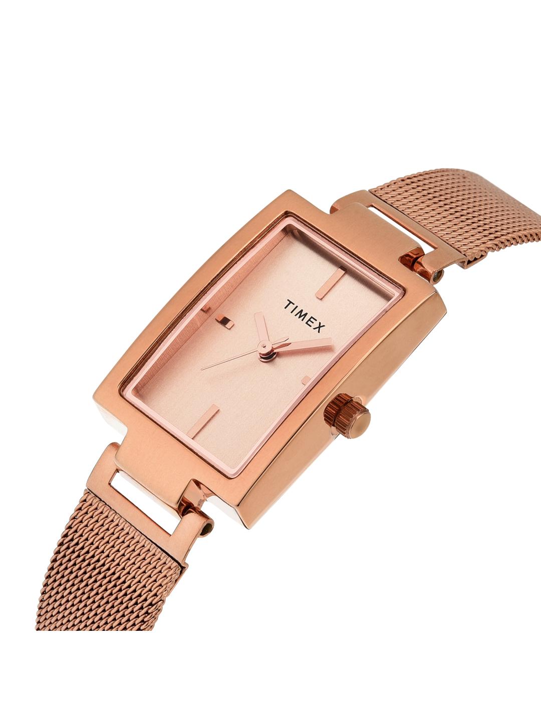 Rose gold Timex watch with mesh band on a white background