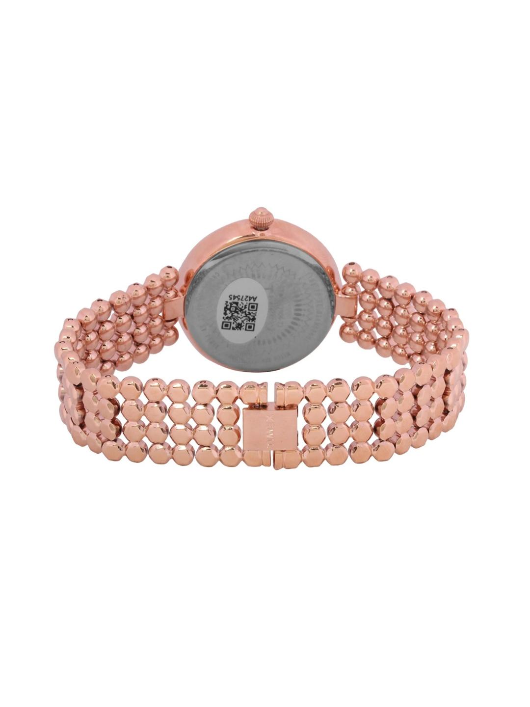 Rose gold watch with a textured band on a white background
