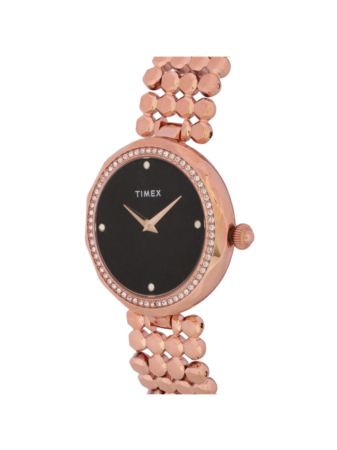 Timex watch with rose gold floral bracelet on a white background
