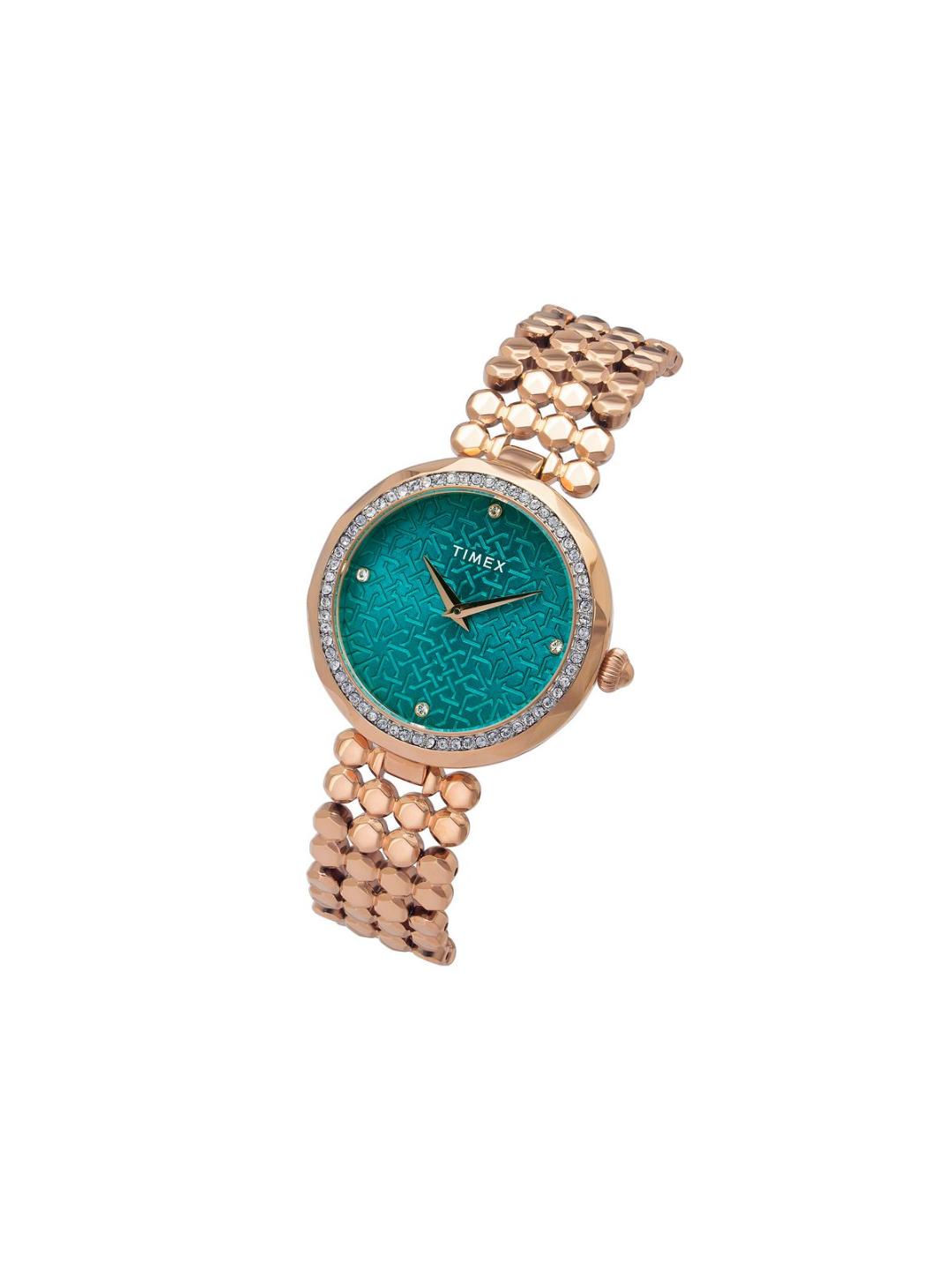 Rose gold watch with turquoise face on a white background