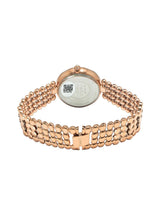 Rose gold watch with a white face on a white background