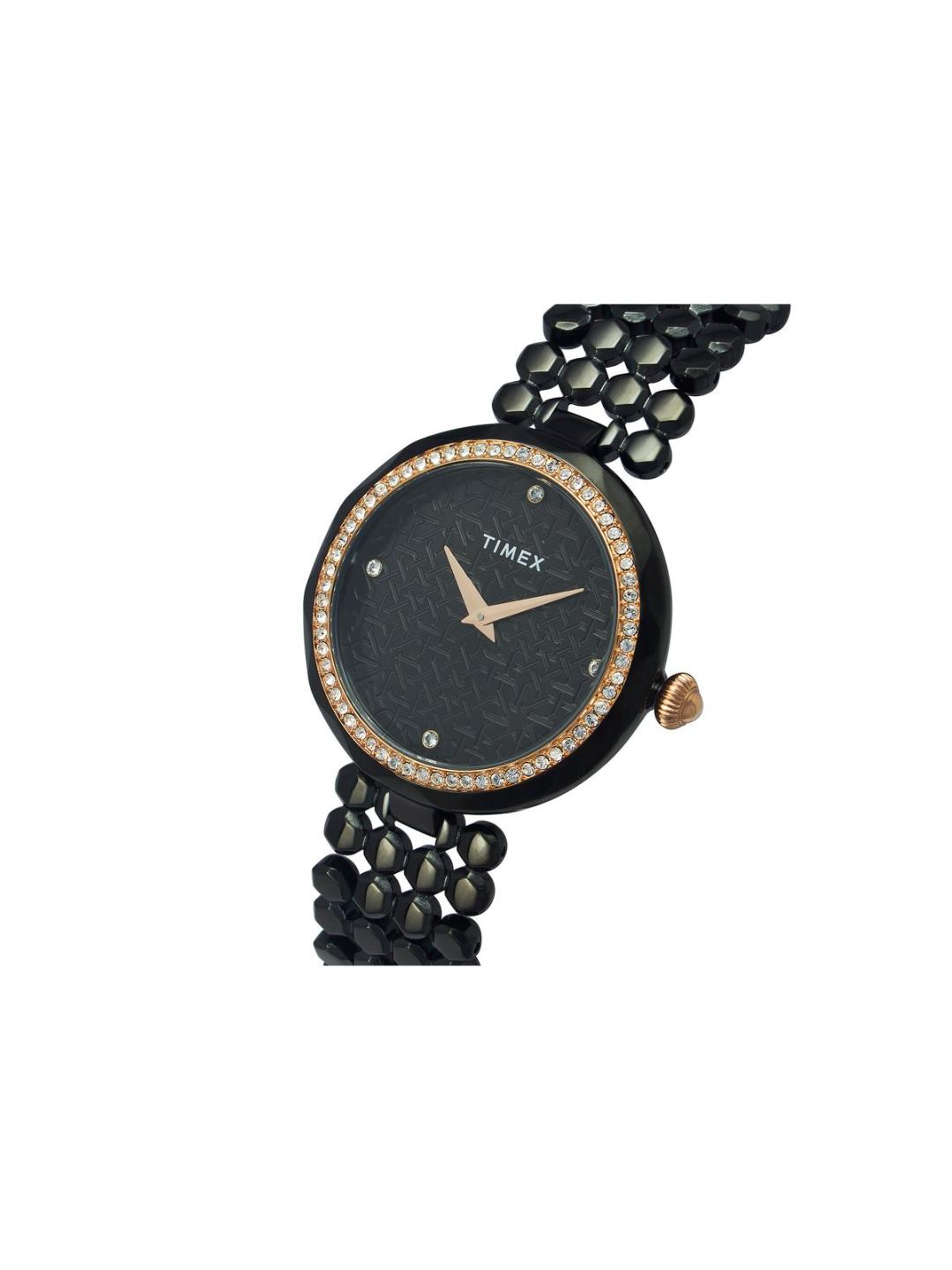 Black wristwatch with gemstone accents on a white background