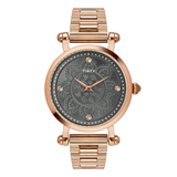 Rose gold Timex watch with a detailed face on a white background