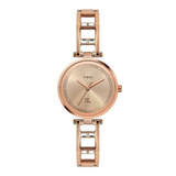 Rose gold watch with a white background