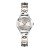Silver and rose gold watch with 'GUESS' branding on a white background
