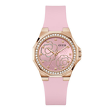 Pink watch with rose design and Guess branding on a white background