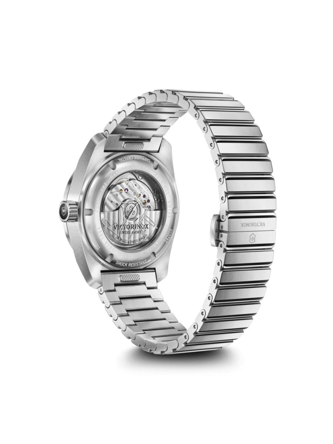 Silver watch with a detailed face on a white background