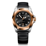 Victorinox watch with black strap and rose gold accents on a white background