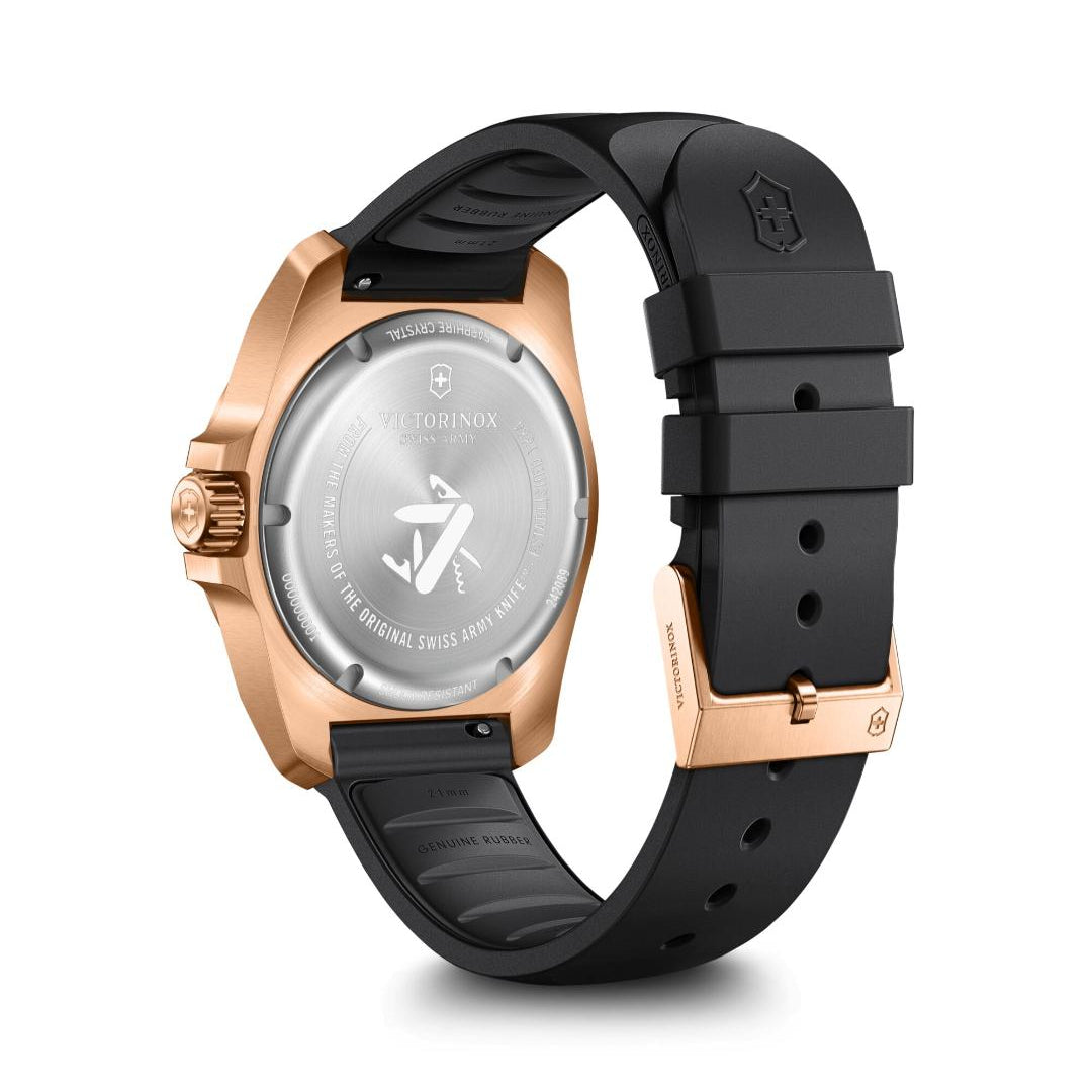 Wristwatch with black strap and rose gold case on a white background