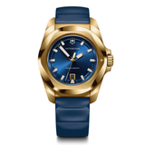 Victorinox watch with gold case and blue strap on a white background