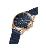 Watch with blue strap and rose gold case on white background