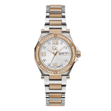 A women's two-tone stainless steel and rose gold watch with a white dial, crystal gemstone bezel, and a day and date window.